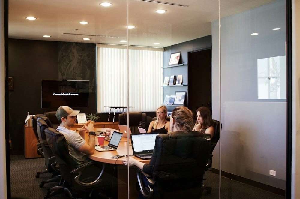 lawyers and clients conducting in a conference room lawyers and clients conducting in a conference room
